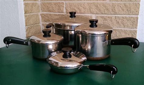 3 pots Revere ware, one Aluminum Clad, fry pan Ekco. . Revereware pots and pans